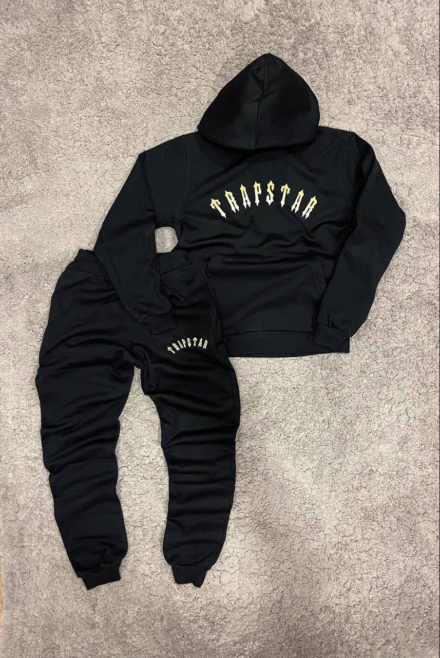 Trapstar negro y amarillo