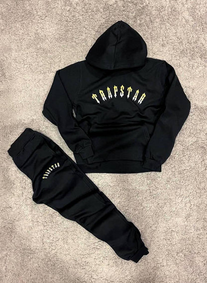 Trapstar negro y amarillo