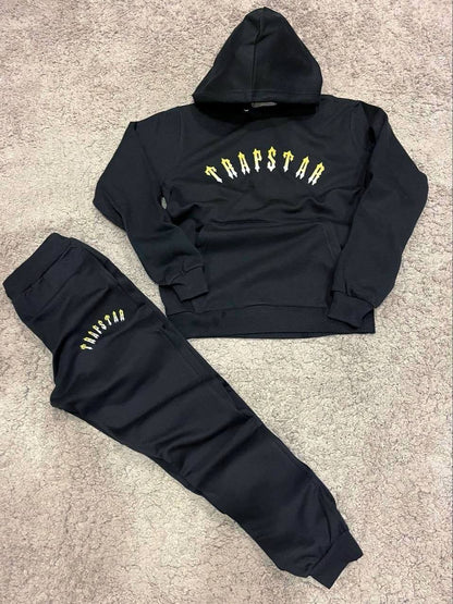 Trapstar negro y amarillo
